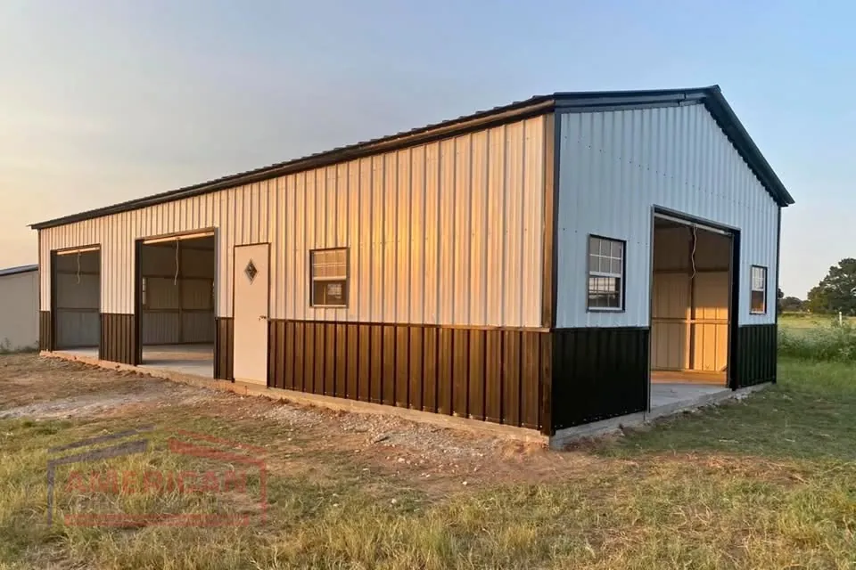 Two-tone steel building with overhead doors built by Wohletz in Ponca City, Oklahoma